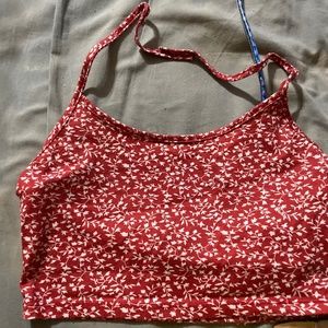 1 flower and 1 purple crop top